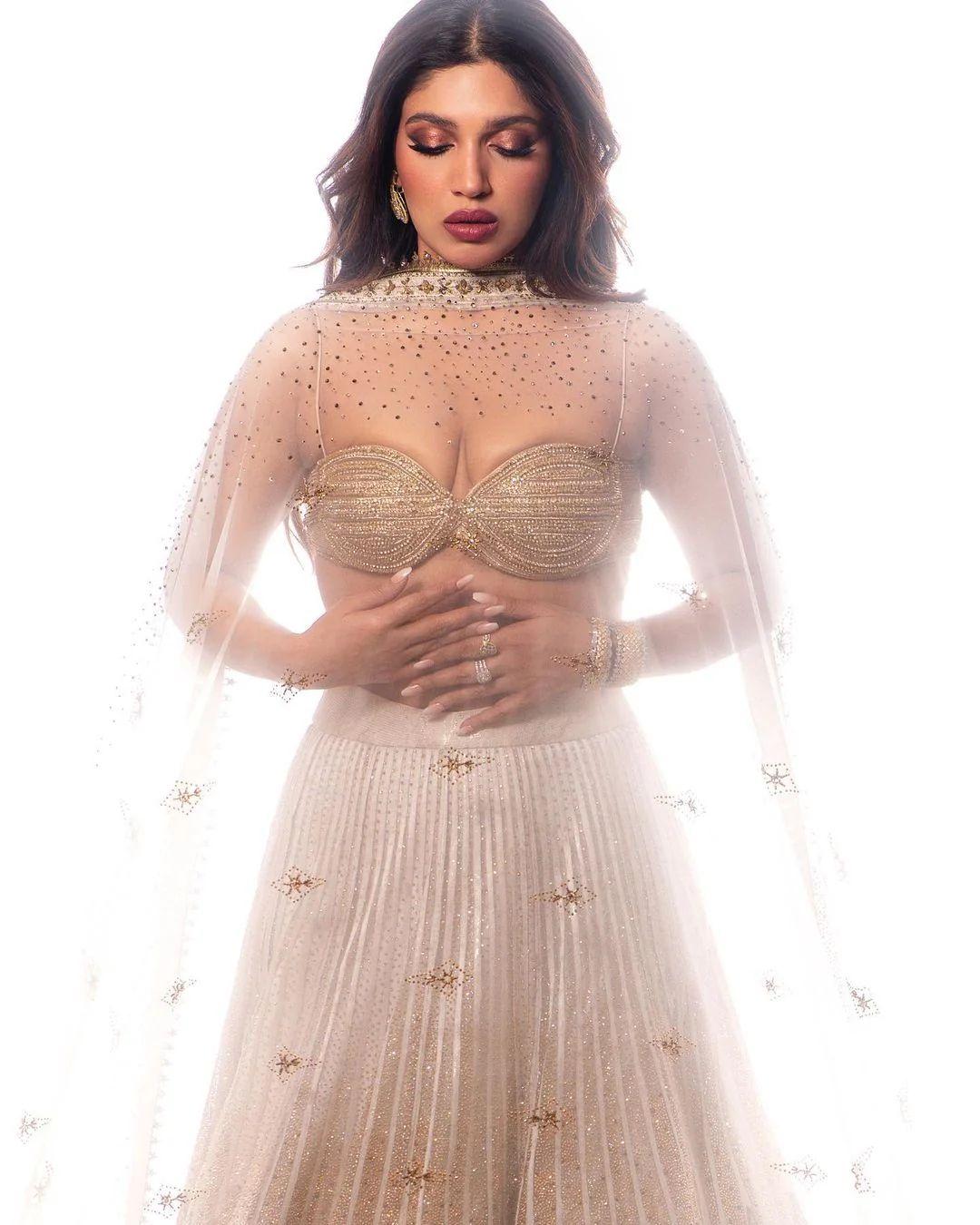 Bhumi mesmerizes in an all-white lehenga, reimagined with a modern twist.